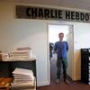 Francouzský kreslíř Charb v redakci týdeníku Charlie Hebdo